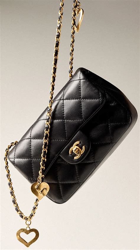 chanel mini charm bag|Chanel handbags with charms.